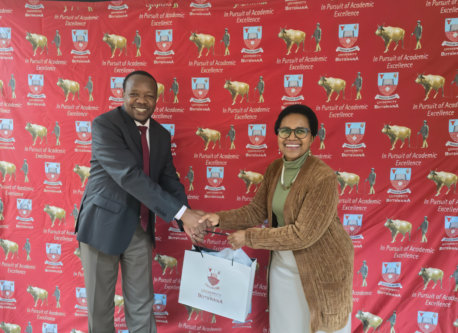 WHO Country Representative, Dr. Fabian Ndenzako with Dean of the Faculty of Health Sciences; Professor Phaladze